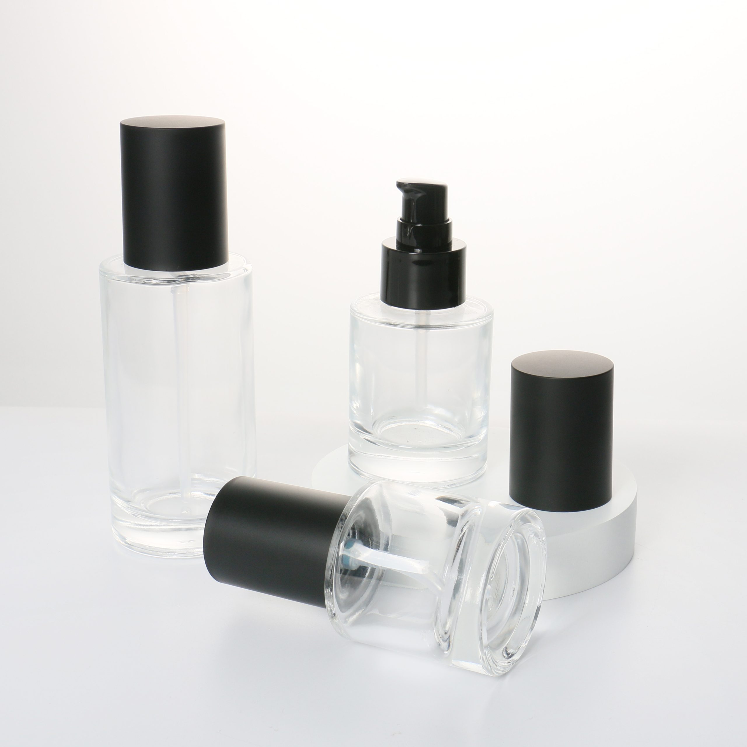 Luxury 30ml 50ml 100ml Clear Frosted Lotion Container Cream Liquid Foundation Bottle Cosmetic Glass Bottle With Pump