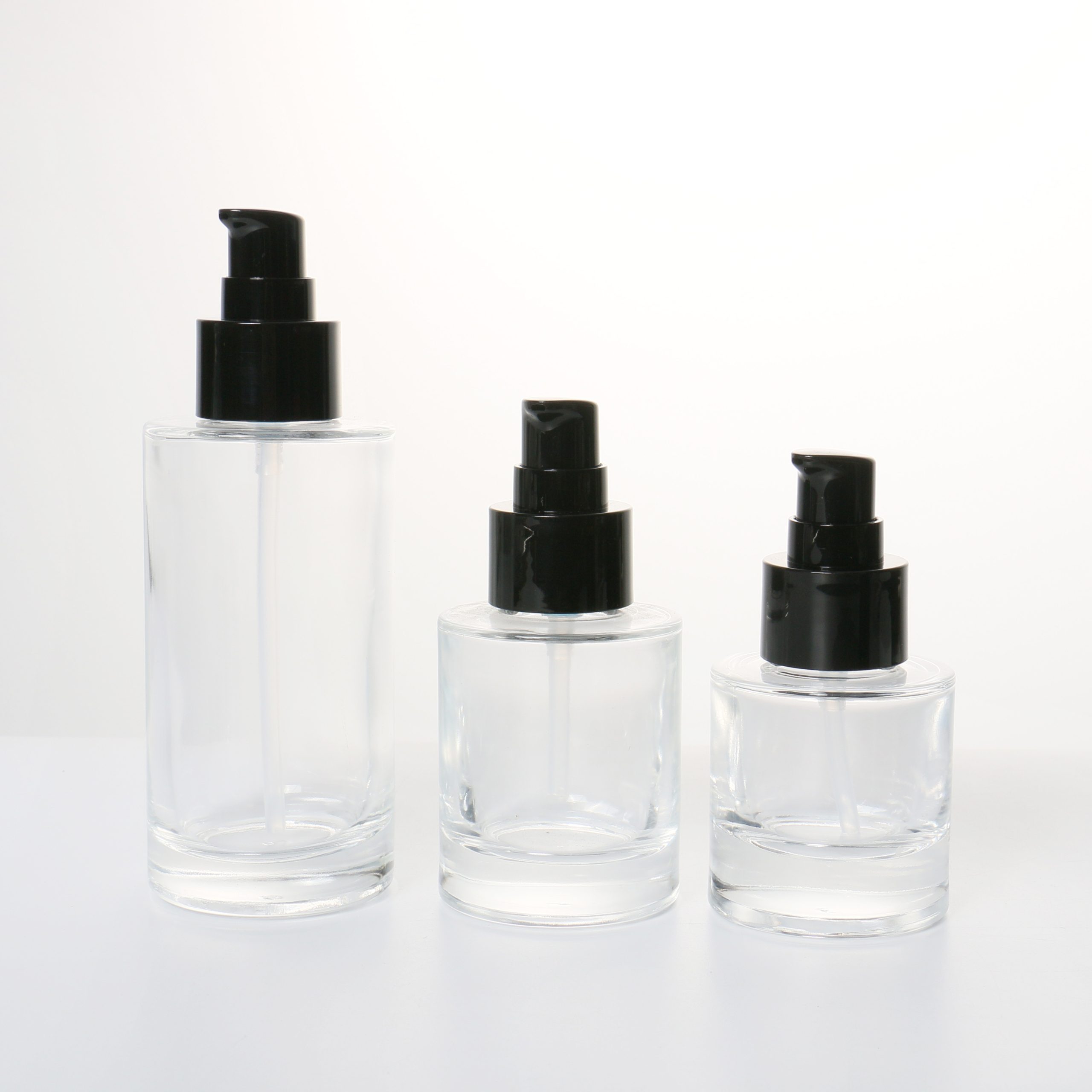 Luxury 30ml 50ml 100ml Clear Frosted Lotion Container Cream Liquid Foundation Bottle Cosmetic Glass Bottle With Pump