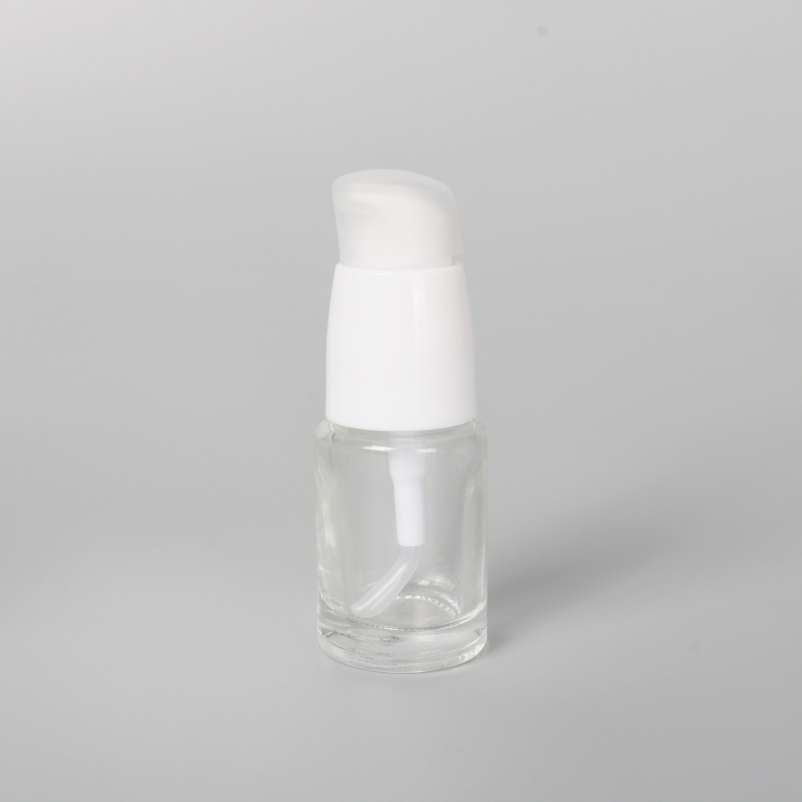 Eco Friendly 30ml 60ml 100ml Round Cosmetic Packaging Clear Empty Face Serum Pump Lotion Foundation Bottle Glass Serum Bottle With Pump