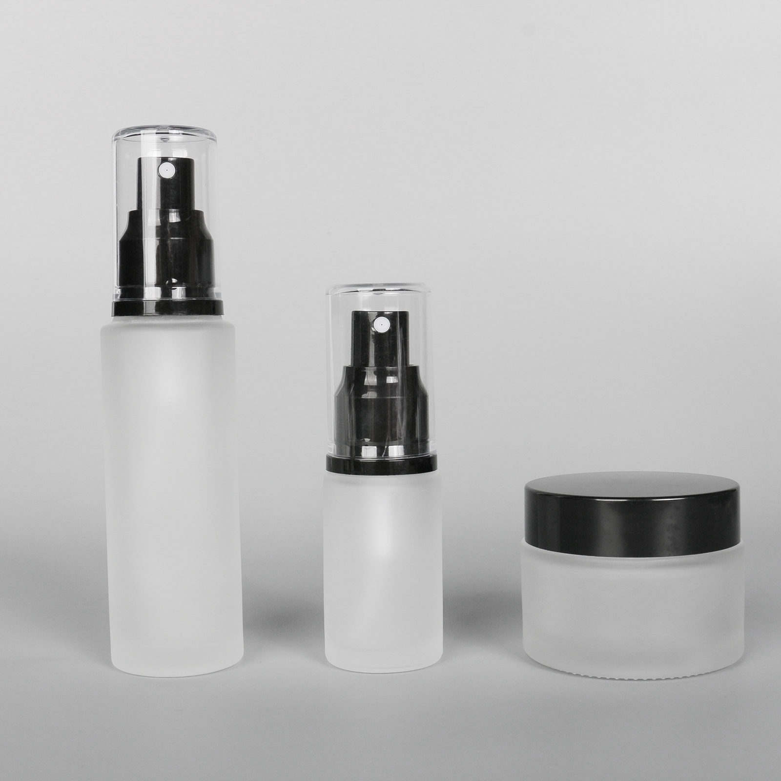 Factory Wholesale Clear Frosted Cylinder Glass Skincare Packaging Set Cosmetic Glass Jar Lotion Pump Sprayer Bottle 20ml,50ml,30g