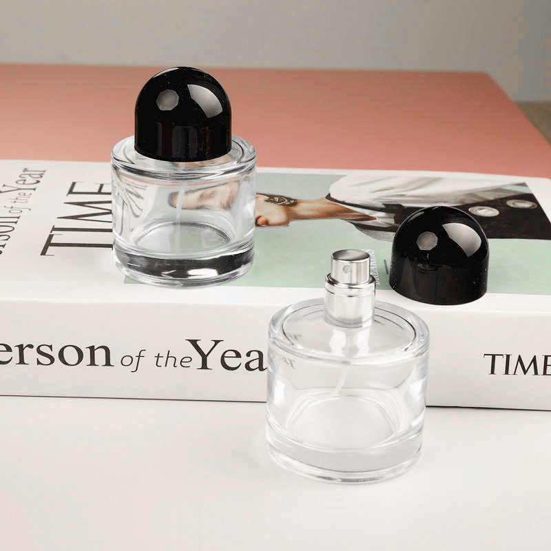 Cosmetic Packaging Luxury 50ml Empty Clear Round Cylinder Perfume Spray Glass Bottle With Black Cap