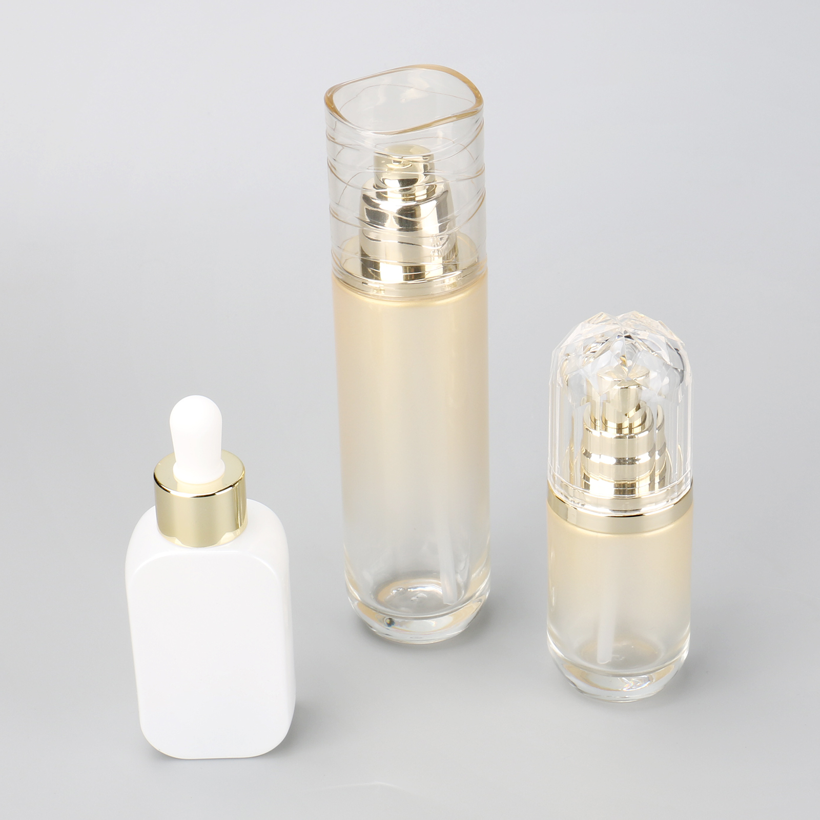 Luxury Skincare Serum Bottle Gold 40ml 100ml Cosmetic Glass Essential Oil Bottle With Dropper And Pump