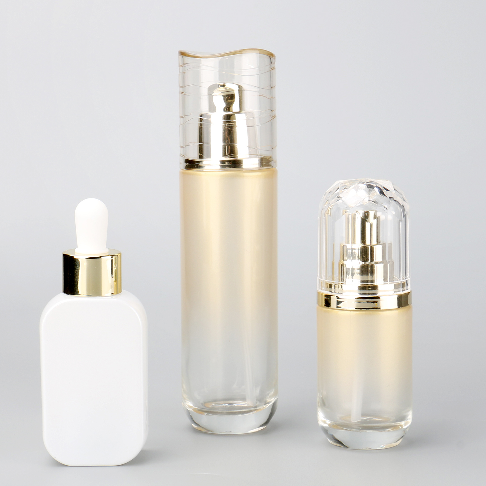 Luxury Skincare Serum Bottle Gold 40ml 100ml Cosmetic Glass Essential Oil Bottle With Dropper And Pump