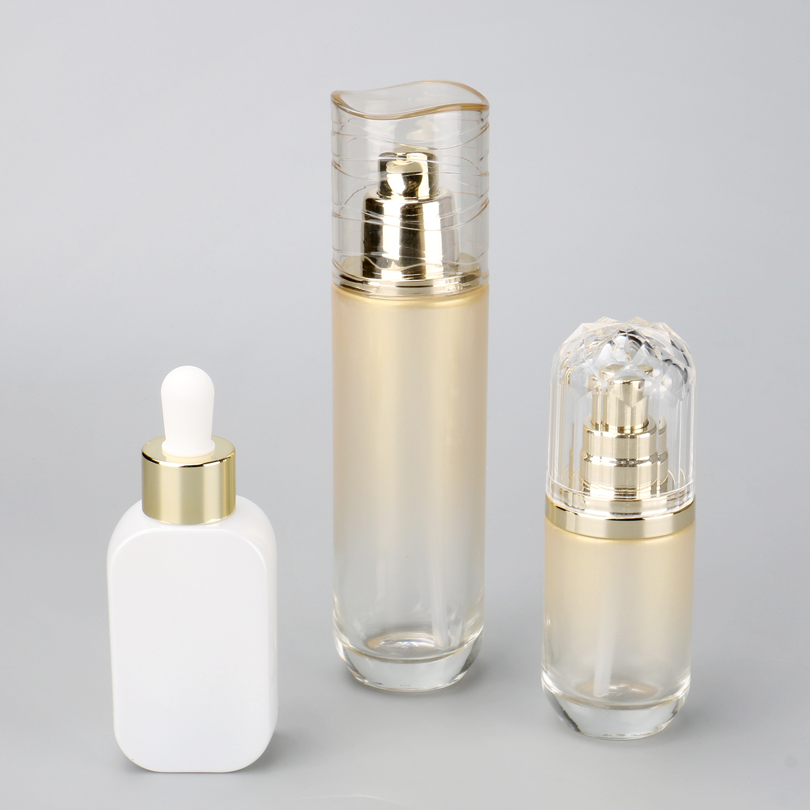 Luxury Skincare Serum Bottle Gold 40ml 100ml Cosmetic Glass Essential Oil Bottle With Dropper And Pump