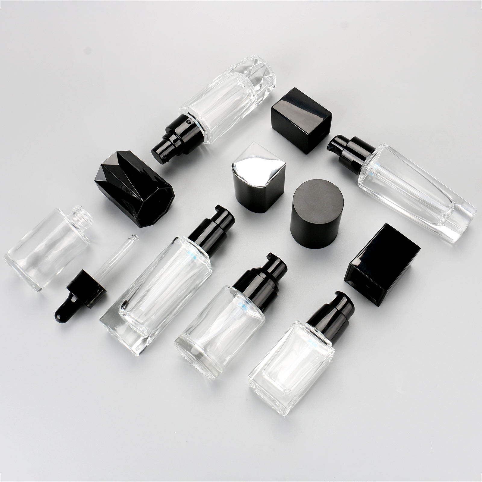 Cosmetic Packaging Container Empty Skincare Set Bottle Transparent Glass Lotion Serum Pump Bottle With Black Lid