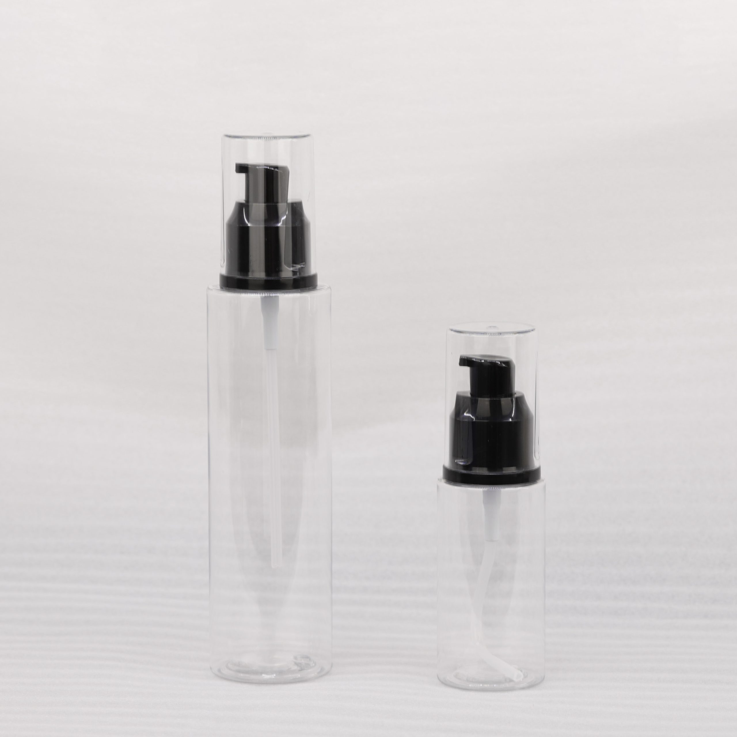 60ML 150ML Round Clear 60ml 150ml Transparent PET Plastic Lotion Pump Spray Bottle With Black Pump