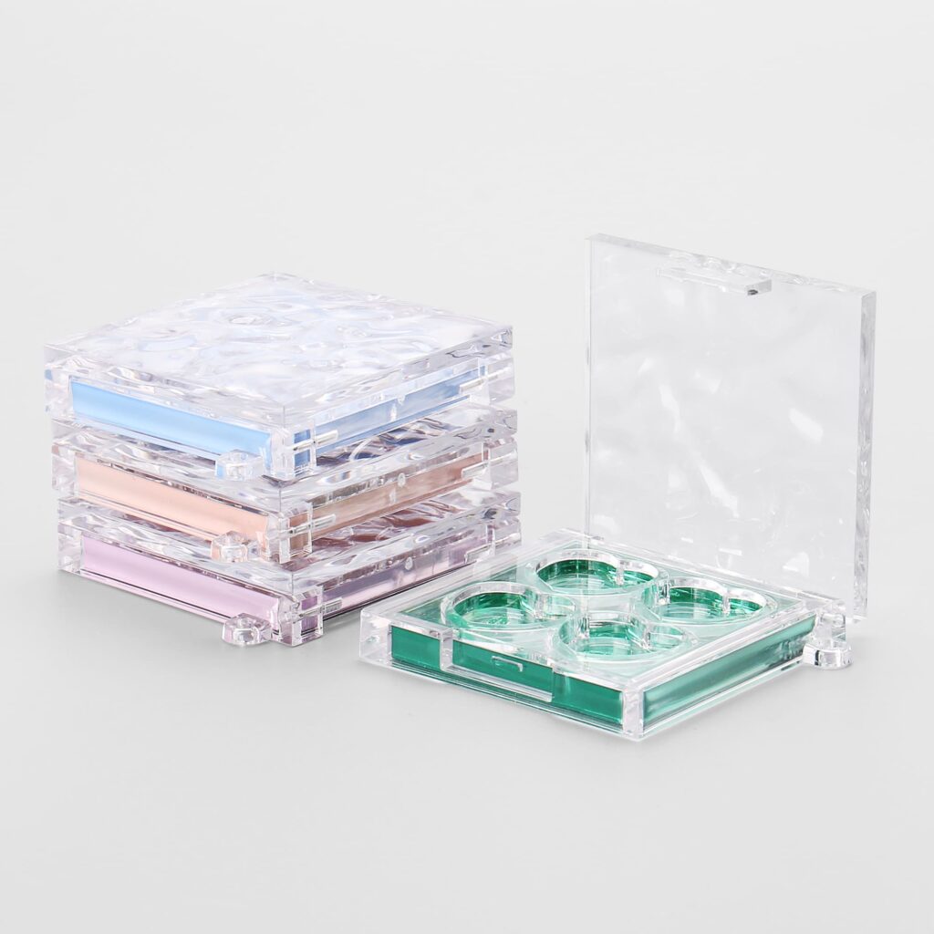 CLEAR 4-PAN MAKEUP PALETTE WITH HEART CAVITIES AND KEYCHAIN LOOP